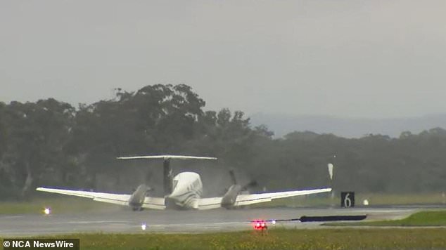 The plane (pictured) landed intact at Newcastle Airport after its landing gear reportedly failed.