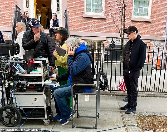 Boardwalk Empire hid his injured left eye behind sunglasses while walking alongside a film crew in Manhattan.