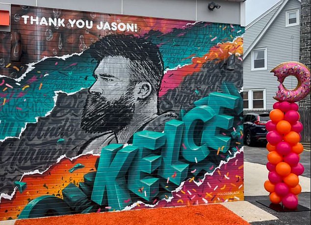 The colorful mural by Glossblack is located in Havertown, a suburb of Philadelphia.