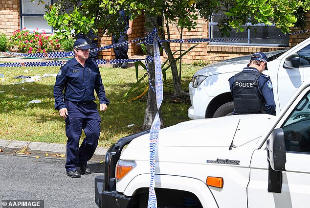 Police are seen at the crime scene in a suburb outside Brisbane on December 27, 2022.