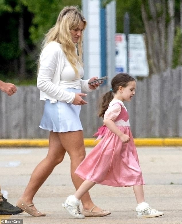 Jamie's mama bear side came out as she kept a close eye on Ivey, who donned a pink dress.