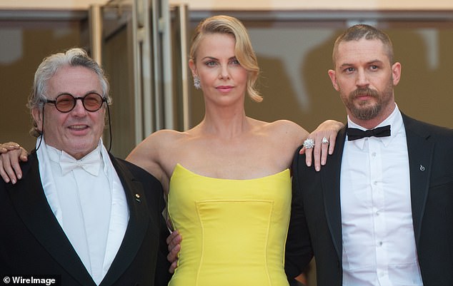 Miller posed with the film's stars at the 2015 Cannes Film Festival.