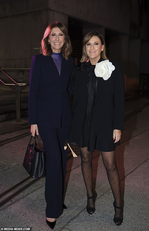 She was joined by Barr, who looked dapper in a navy-purple suit and a sheer turtleneck of the same color. In the photo Natalie Barr and Kylie Gillies.