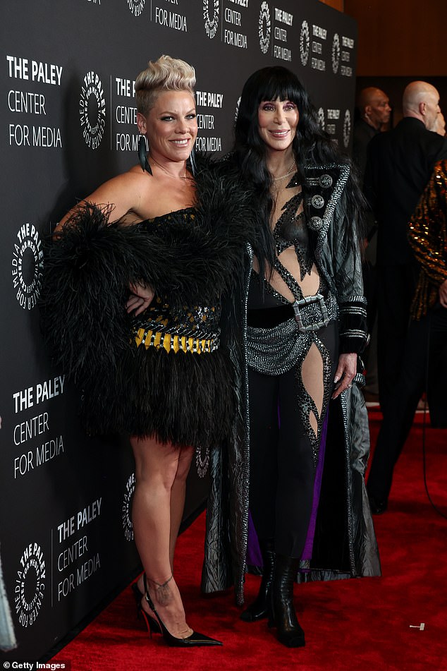 The glamorous girls posed together on the red carpet.