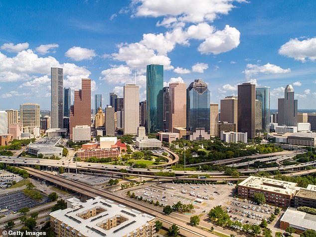 A panoramic photo of downtown Houston, another large American city that operates on prime time.