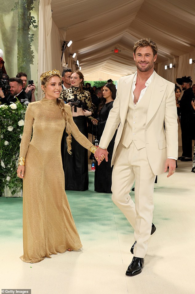 Resembling Greek gods, Chris and Elsa walked hand in hand and opted for similarly colored looks for fashion's night of nights.