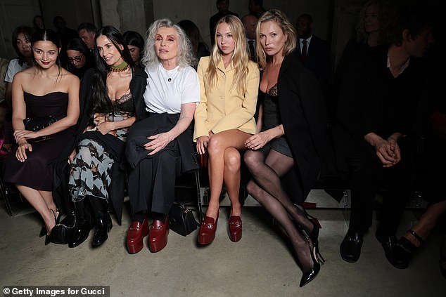 Nikolai was left in the shadows, literally on the far right, while Kate chatted with her model daughter Lila, Blondie star Debbie Harry and Hollywood legend Demi Moore, as well as Alia Bhatt in the front row of the Gucci fashion show Cruise in London.