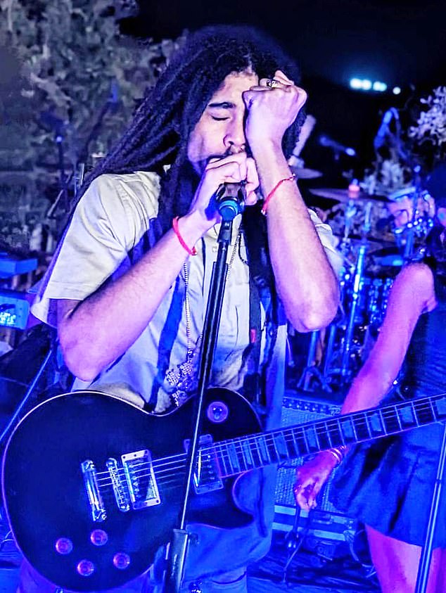 Slip, the 27-year-old grandson of the late reggae superstar Bob Marley, didn't seem too fazed by his passionate enthusiasm as he performed at the launch of the Med Bodrum cultural festival at the Turkish resort's Macakizi hotel (pictured on stage at the event). )