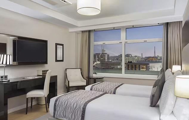 One of the hotel rooms that has beautiful views of the city.