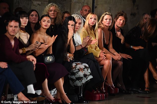 The star sat front row alongside big names like Kate Moss.