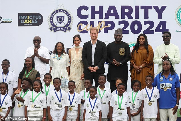 Harry and Meghan after a charity polo match at the Ikoyi Polo Club in Lagos on May 12