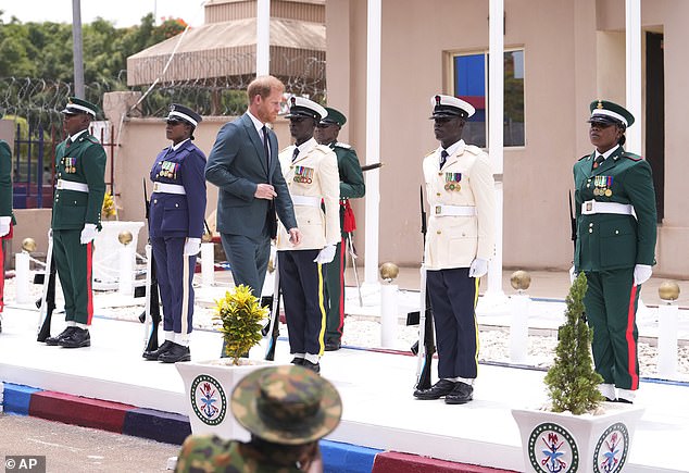 Prince Harry is welcomed at Defense Headquarters in Abuja, Nigeria, on May 10.