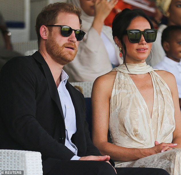 Harry and Meghan attend a polo fundraising event in Lagos during their tour of Nigeria on May 12.