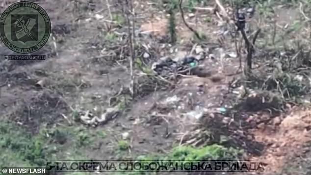 After eliminating two targets, the Ukrainian soldier points his gun at two other Russian soldiers, who are seen lying a little further away.