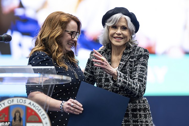 Horvath, left, presents Jane Fonda with a proclamation that April 30 is "Jane Fonda Day" in Los Angeles County