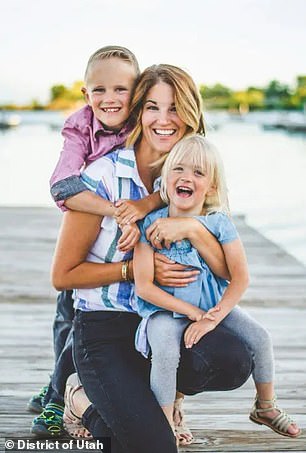 Mrs Dressen is pictured above with her children.