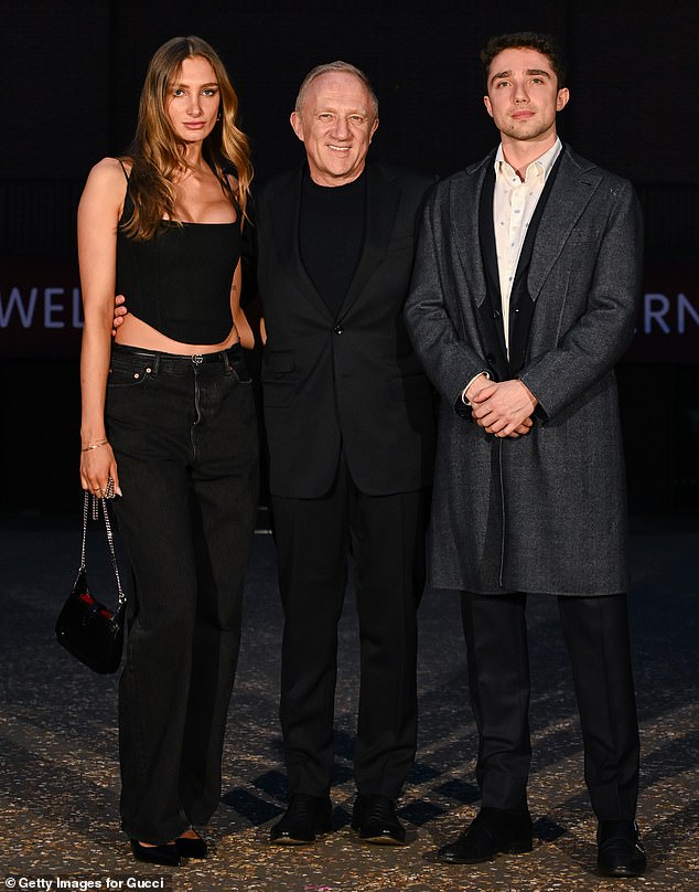 Seen with dad and brother Francois Pinault Jr.