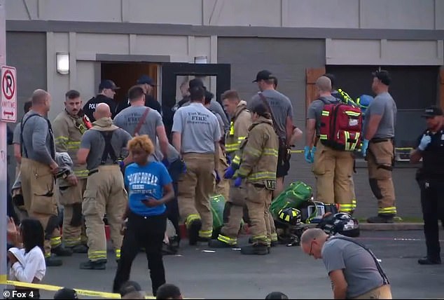 The injuries and identities of those affected have not yet been made public. Police are seen at the crime scene on May 1.