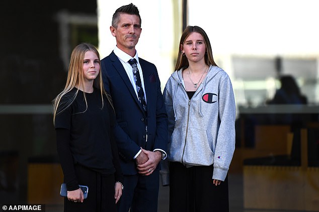 Lee Lovell and his daughters Kassie (left) and Scarlett (right) pictured outside court.