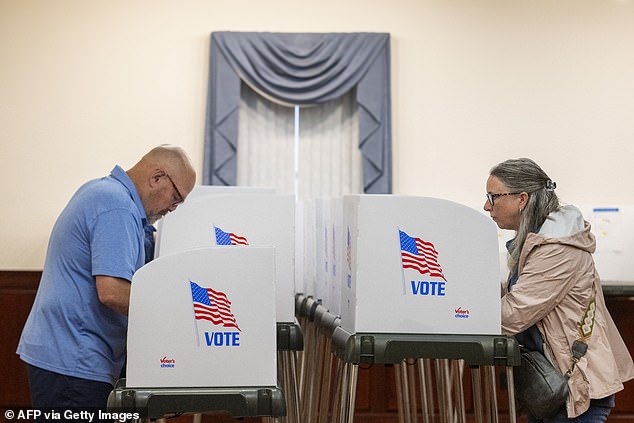 Voters cast their ballots in the Maryland primary election in Chester, MD, on May 14.