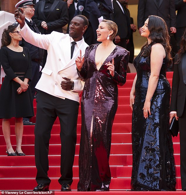 Killers of the Flower Moon actress Lily, 37, made a heart for the adoring crowd at The Second Act screening, while Greta, 40 (centre), was seen making a sign of peace while posing for a selfie.