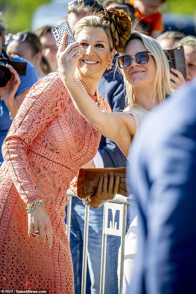 Máxima, queen of Holland, posed for selfies with people who were waiting to meet her