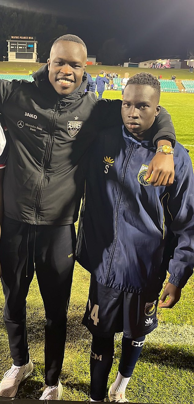 Kuol Mawien Kuol (left) is pictured with his brother Garang (right), who is currently playing on loan at FC Volendam after signing for Newcastle United.