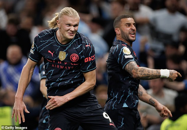 Erling Haaland scored two goals and Manchester City returned to the top of the Premier League table