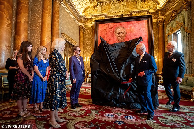 King Charles unveils his portrait by artist Jonathan Yeo at Buckingham Palace today.