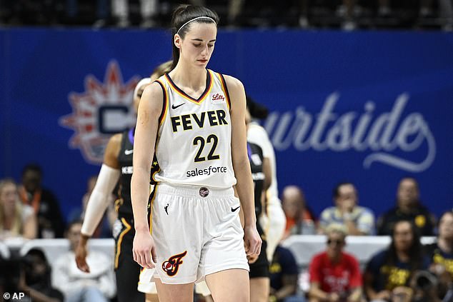 Caitlin Clark (22) walks down the court after a turnover against the Connecticut Sun