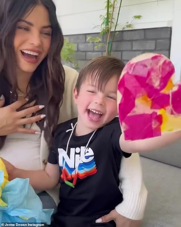 Callum looked adorable in a short video in which he opened a present while sitting on his mum's lap.