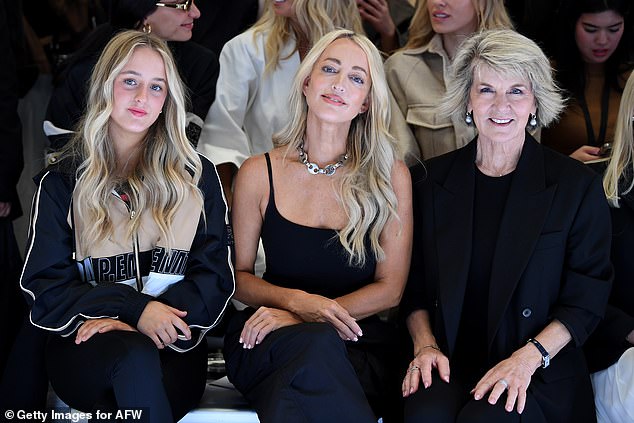 Jackie has had a busy few days attending Australian Fashion Week with her 13-year-old daughter Kitty (both pictured alongside Julie Bishop at Pip Edwards' PE Nation show on Tuesday).