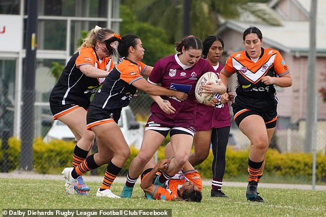 The club's popular identity (pictured carrying the ball) received the news she feared, and now her teammates and friends are pitching in to help her.