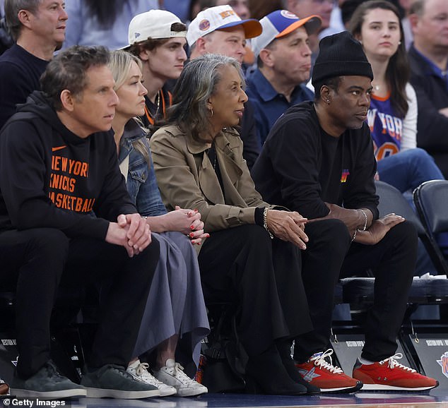 The four watched intently as they cheered on the Knicks.