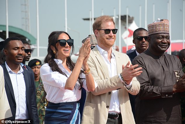 Prince Harry and Meghan photographed during their recent visit to Nigeria to promote the Invictus Games