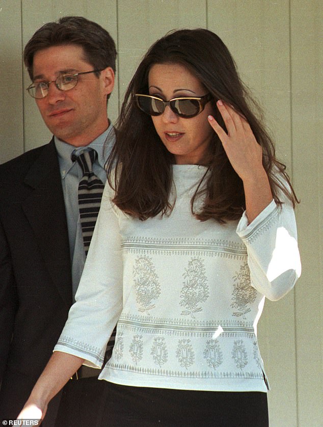 Amy was sentenced to seven years in prison and became a porn star after being released. (pictured: Amy walking from the Albion Women's Correctional Facility with one of her attorneys)