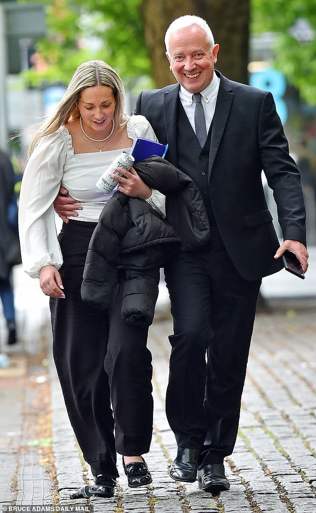 Joynes arrived at court and left Manchester Crown Court laughing with her father on Tuesday afternoon.