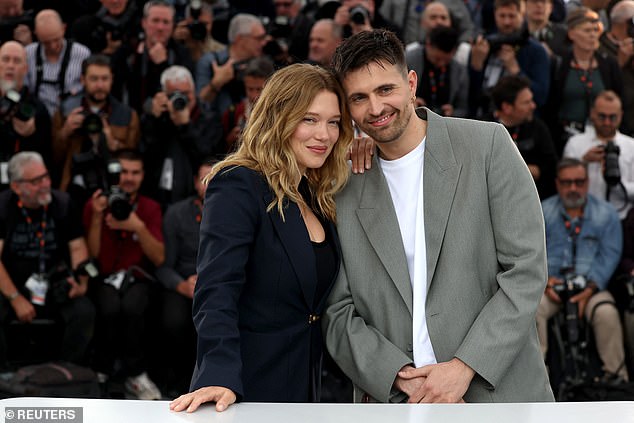 Raphael Quenard looked dapper in a gray suit while posing with Lea