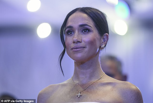 It appears Meghan also chose to honor her late mother-in-law once again on Saturday by wearing a gold cross necklace that, a source told Page Six, actually belonged to Diana.