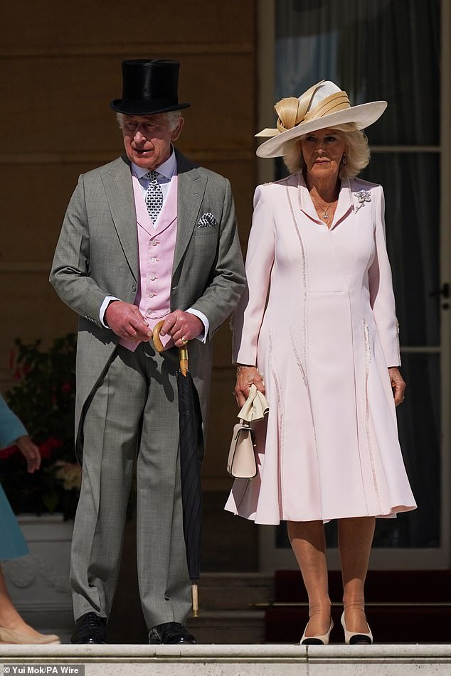 The King, 75, looked dapper in a three-piece suit, while Queen Camilla cut a sophisticated figure in a baby pink long-sleeved A-line dress with fringe details.