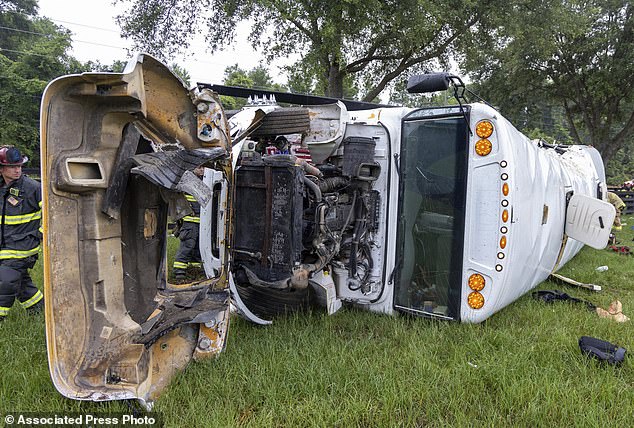 Howard also said that on Monday night he had taken two anti-seizure medications and high blood pressure medication, in addition to smoking marijuana oil. (In the photo: the bus is seen overturned on the grass after the accident)