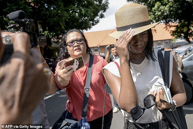 Smith had been on holiday with his wife of four months, Tracy Ijusa (pictured), when police raided their room at the Champlung Mas hotel in Legian on April 30.