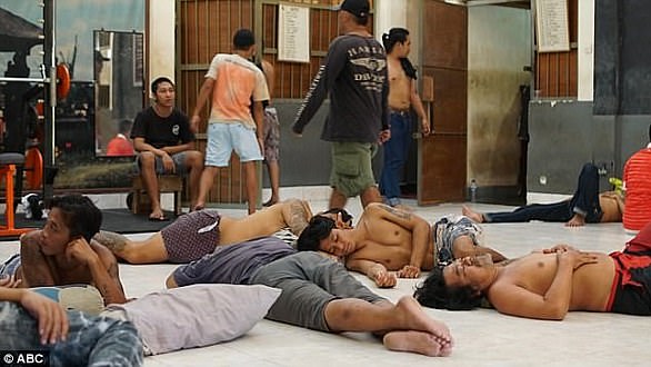 Inmates are photographed inside the famous Kerobokan penitentiary in Bali, Indonesia.