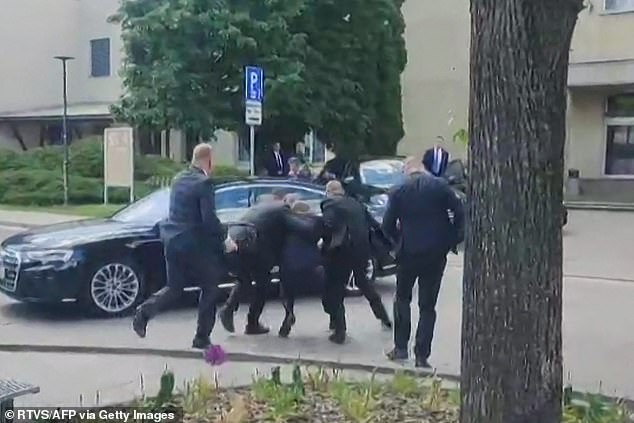 Video obtained by AFPTV shows security personnel carrying Prime Minister Fico to a vehicle after he was shot in Handlova.