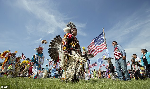 Members of the Standing Rock Sioux Tribal Nation dance during Flag Day celebration