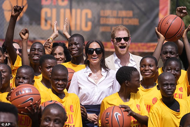 Prince Harry and Meghan at the Dream Big Basketball clinic in Lagos, Nigeria, last Sunday