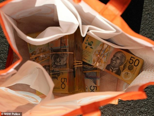 Police found and seized more than $50,000 in cash at an address