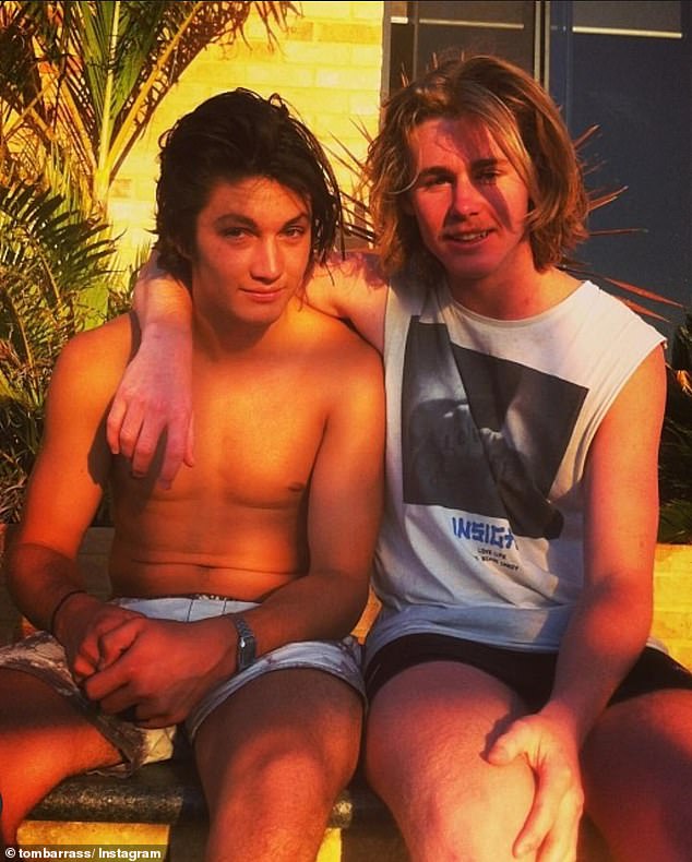 McCarthy (right) is pictured with his childhood friend and fellow AFL star Tom Barrass, who remembered him in an emotional Instagram post.