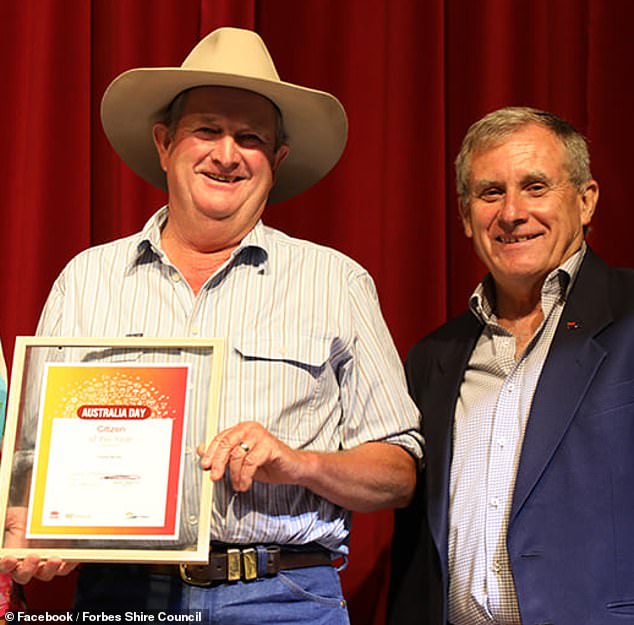 Lawrence 'Laurie' Norris is pictured (center) with Mayor Forbes after receiving his 2022 Citizen of the Year award.