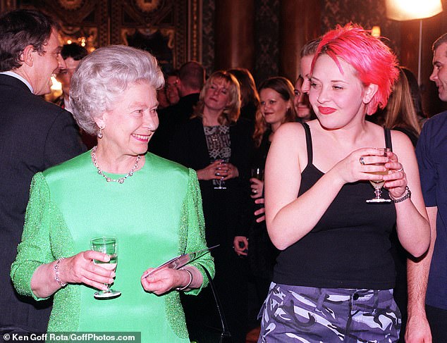 The Queen smiles warmly at Liverpool Institute of Performing Arts student Julie Thompson (right) after her performance at Buckingham Palace, 1998.